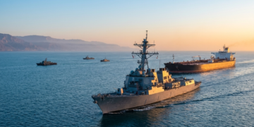 THE HORMUZ BREAKTHROUGH: US Navy Defies Iran as Oil Prices Collapse and Digital Markets Pivot